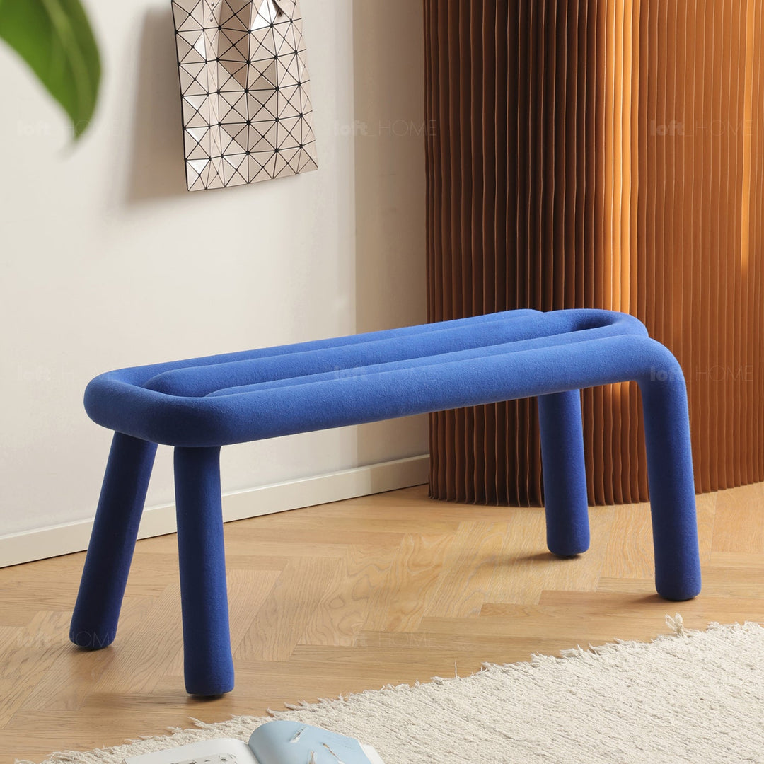 Contemporary velvet fabric dining bench bold in details.