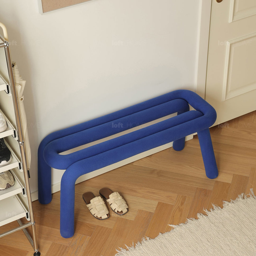 Contemporary velvet fabric dining bench bold in real life style.
