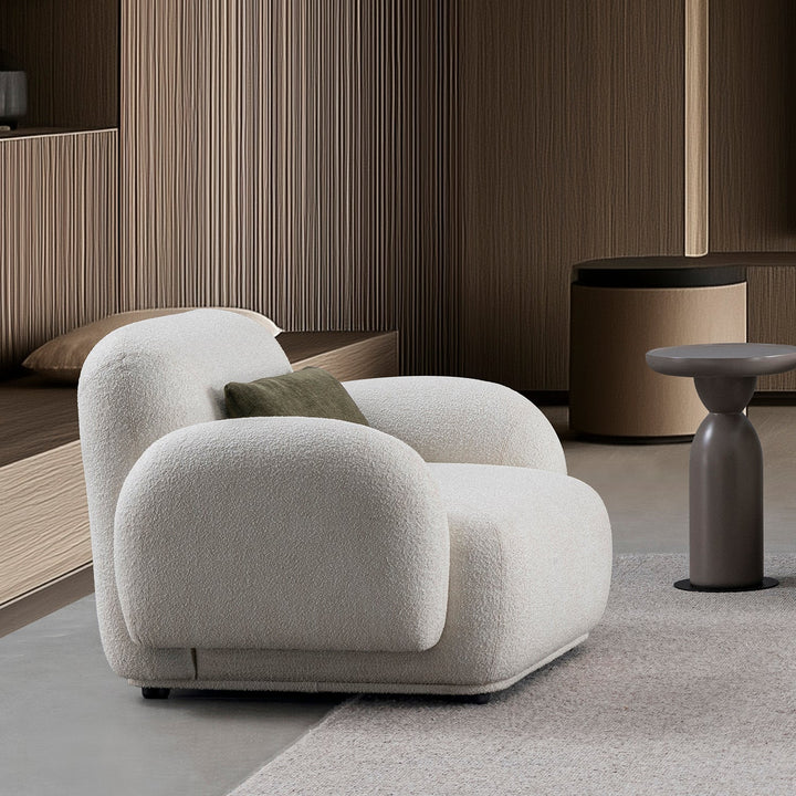 Cream boucle fabric 1 seater sofa pluum primary product view.