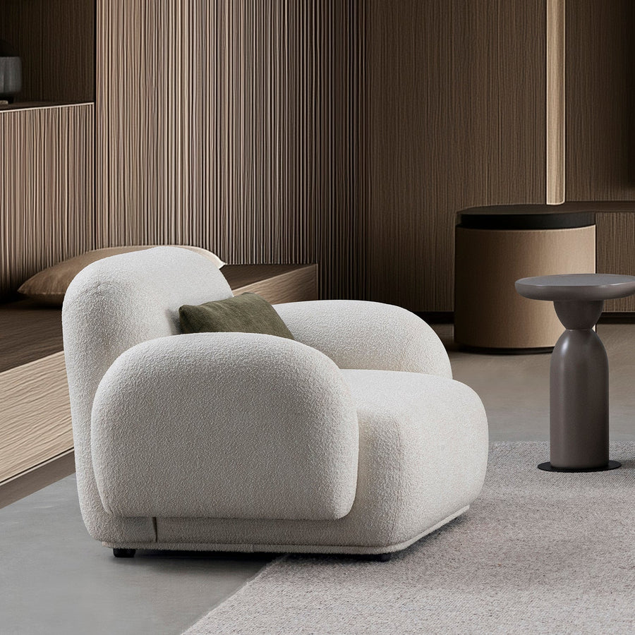 Cream boucle fabric 1 seater sofa pluum primary product view.