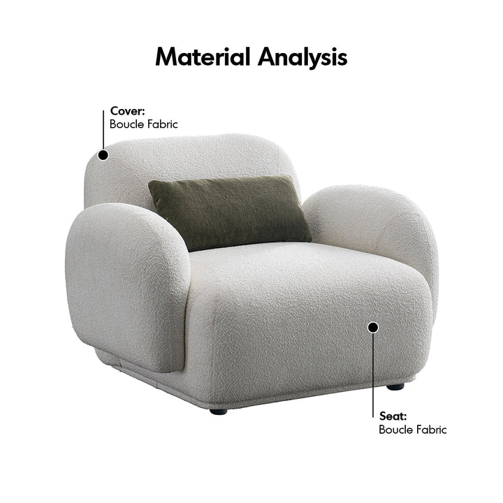 Cream boucle fabric 1 seater sofa pluum with context.