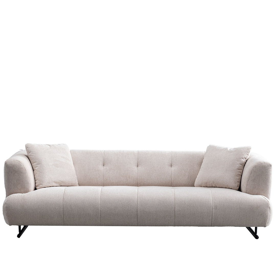 Cream cotton fabric 3 seater sofa verdo in white background.