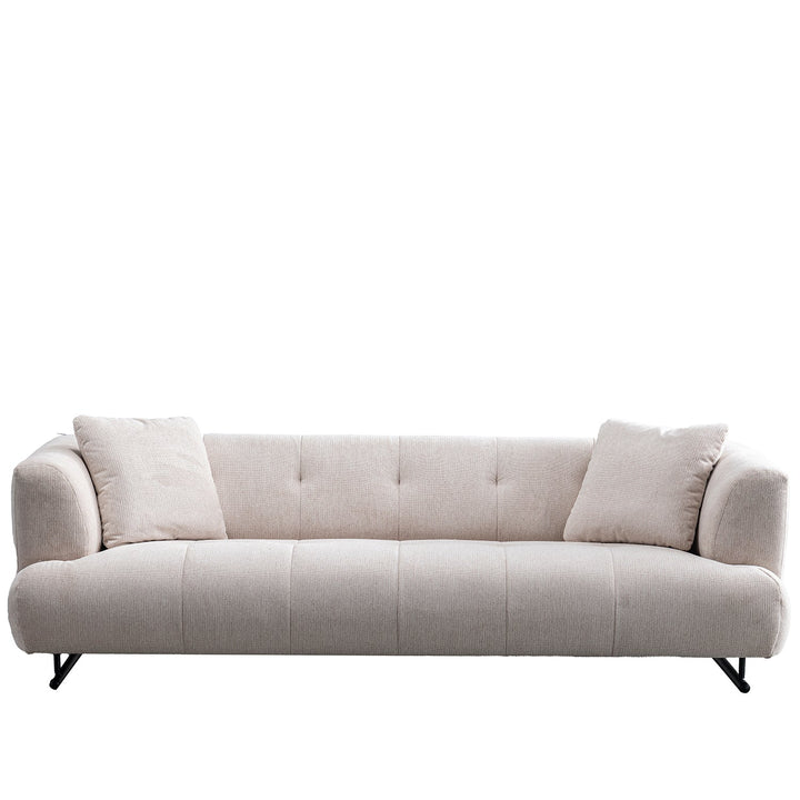 Cream cotton fabric 3 seater sofa verdo in white background.