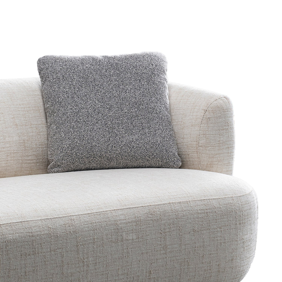 Cream mixed weave fabric 2 seater sofa noiry with context.