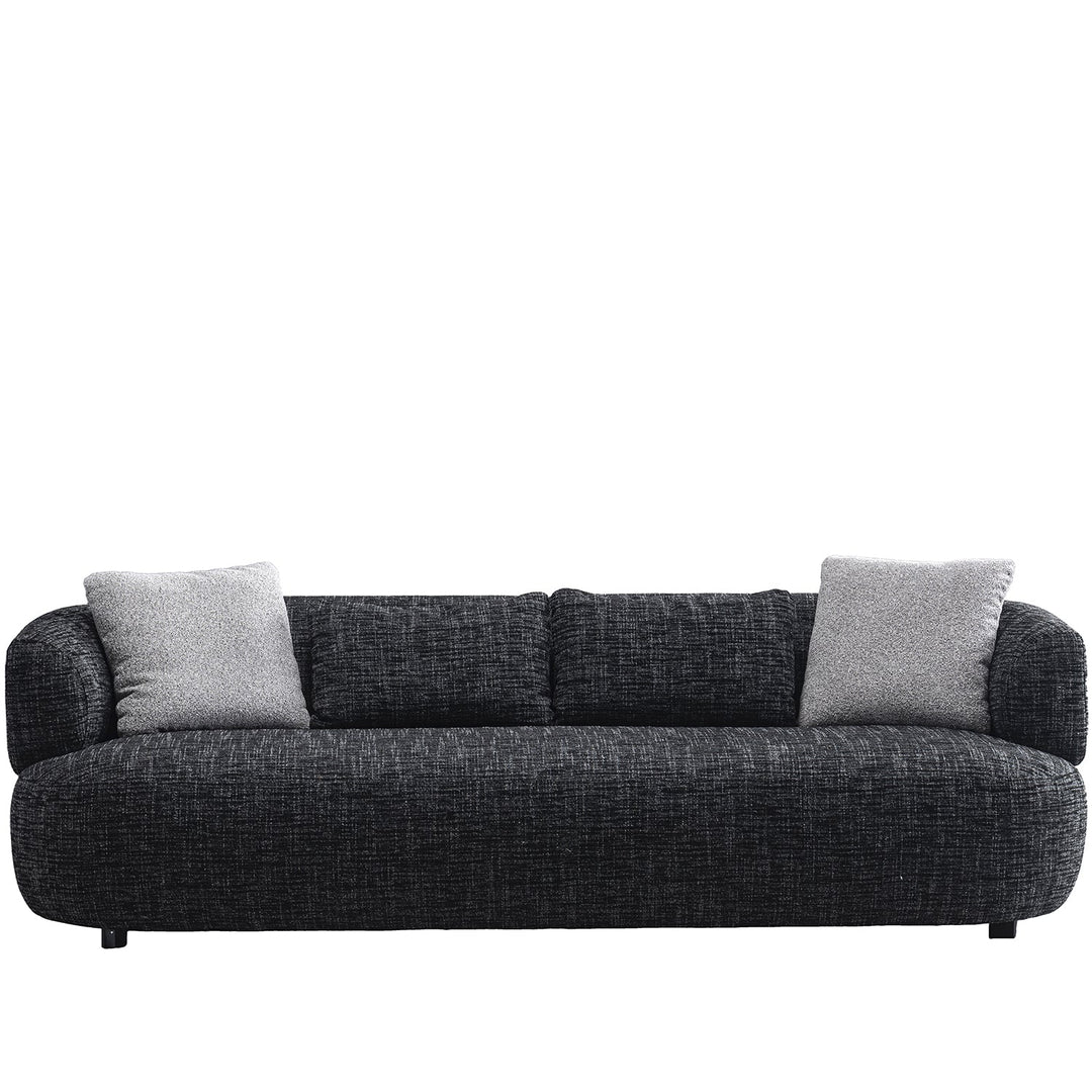 Cream mixed weave fabric 3 seater sofa noiry in white background.