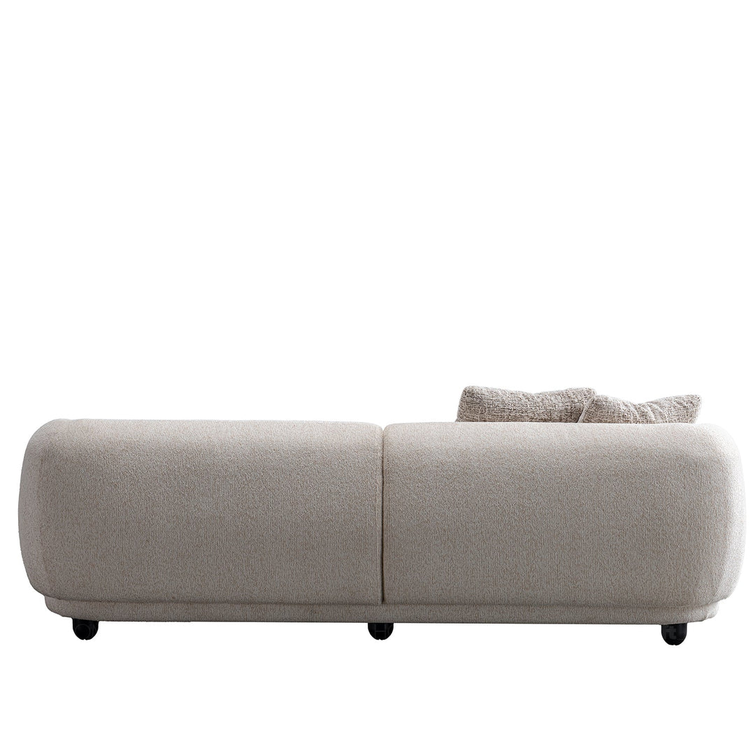 Cream mixed weave fabric 3 seater sofa puffy in details.
