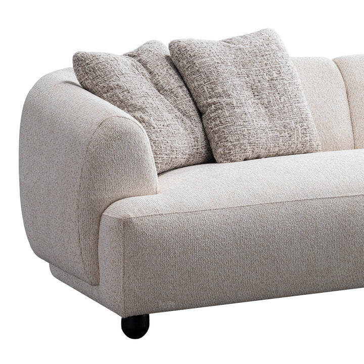 Cream mixed weave fabric 3 seater sofa puffy in close up details.