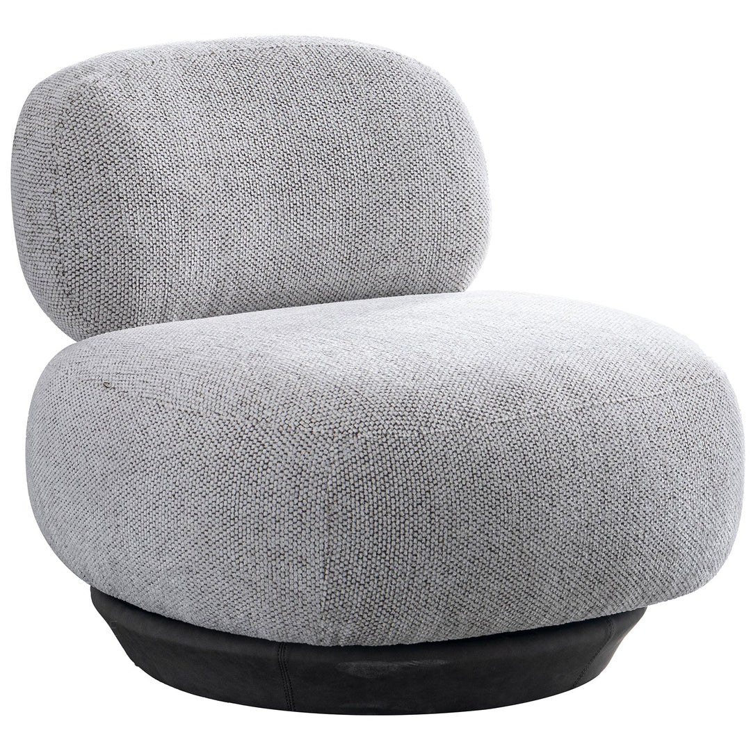 Cream mixed weave fabric revolving 1 seater sofa bixy in still life.