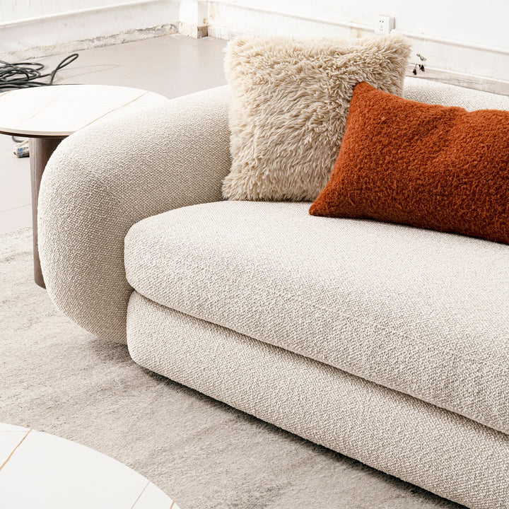 Cream boucle fabric 2 seater sofa curly in real life style.