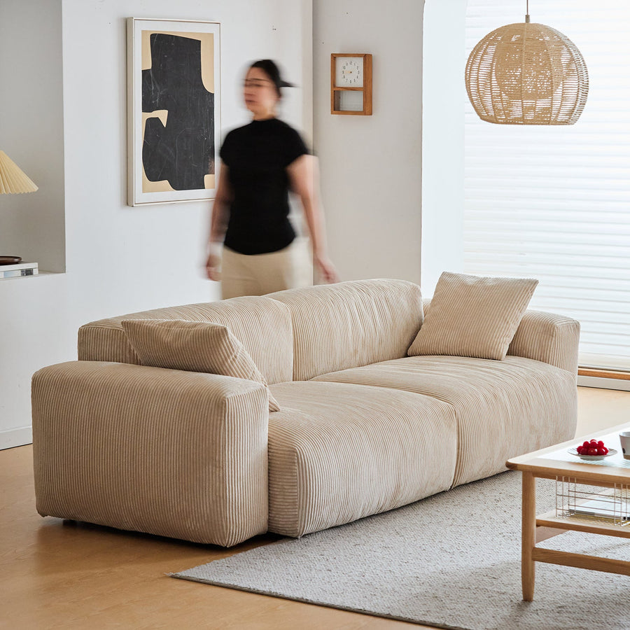 Cream corduroy velvet fabric 3 seater sofa square in details.