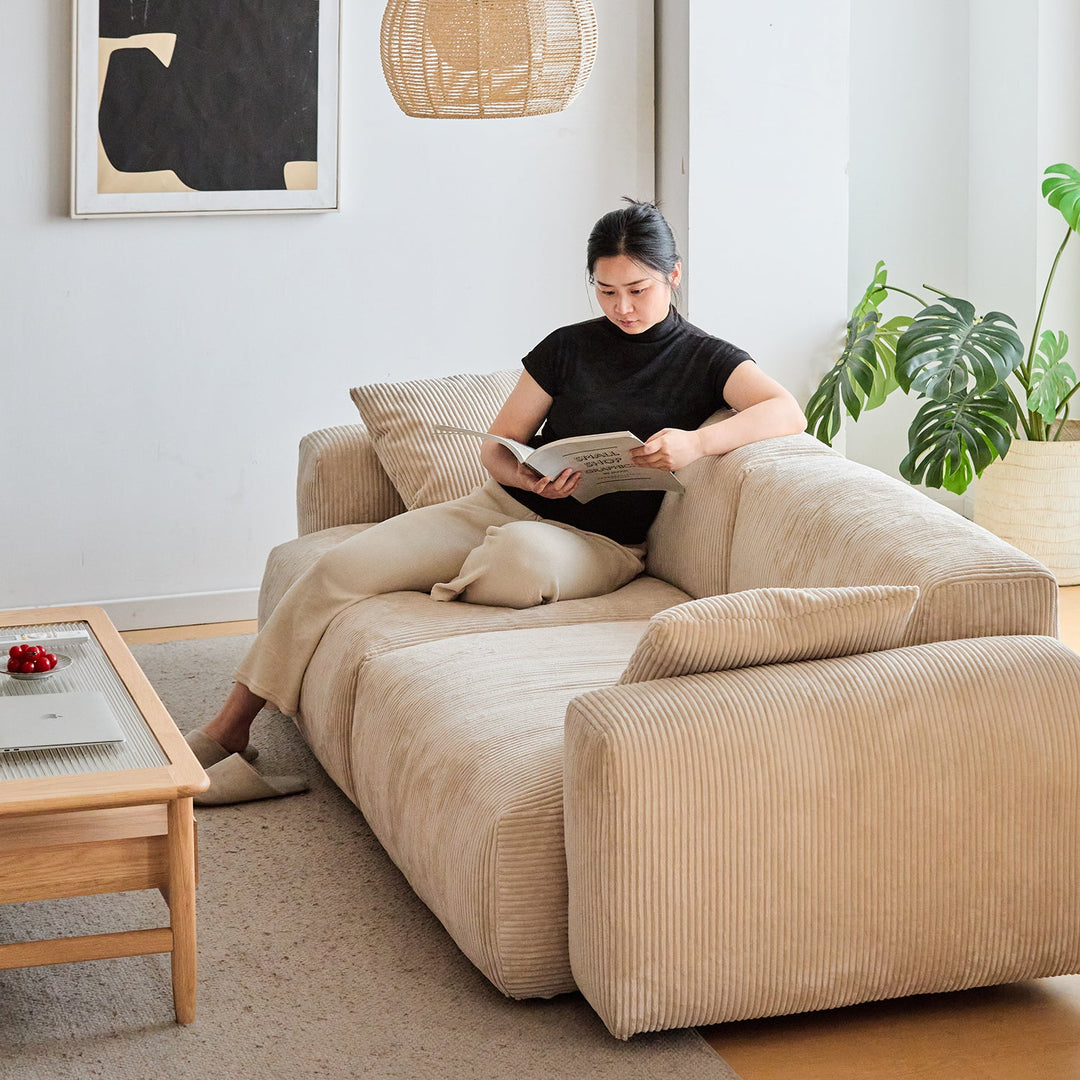 Cream corduroy velvet fabric 4 seater sofa square environmental situation.