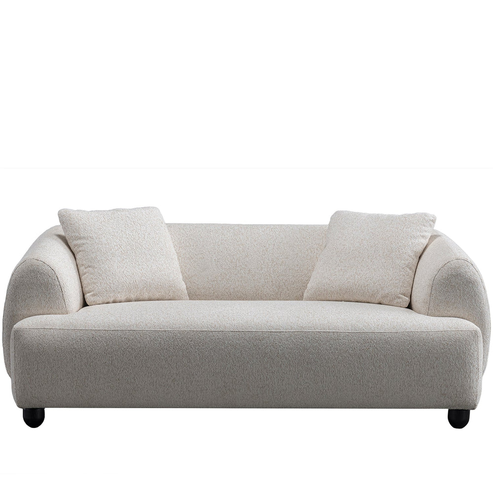 Cream mixed weave fabric 2 seater sofa puffy in white background.