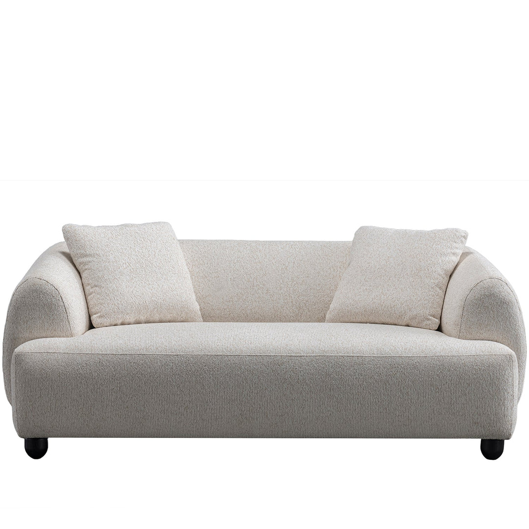 Cream mixed weave fabric 2 seater sofa puffy in white background.
