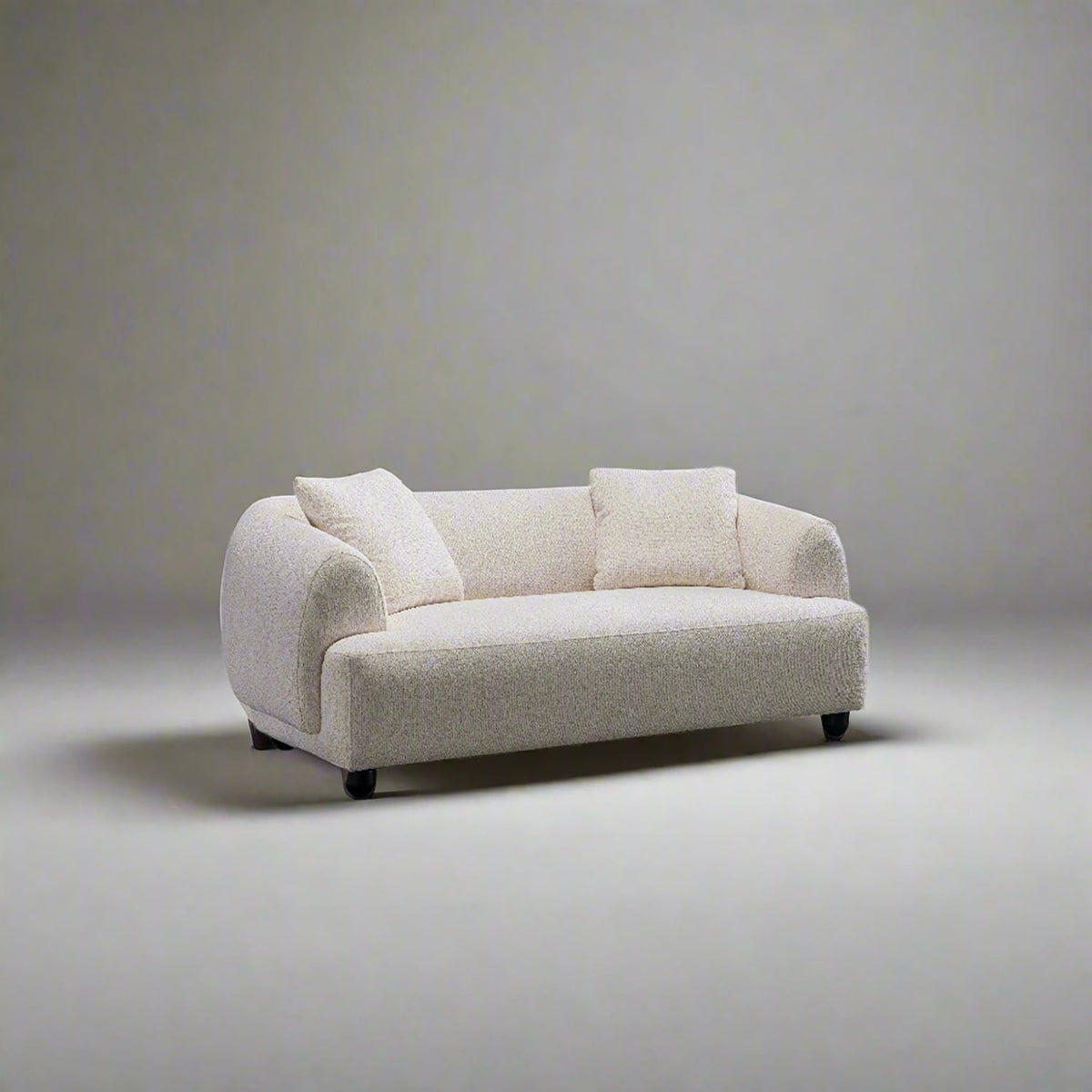 Cream mixed weave fabric 2 seater sofa puffy color swatches.