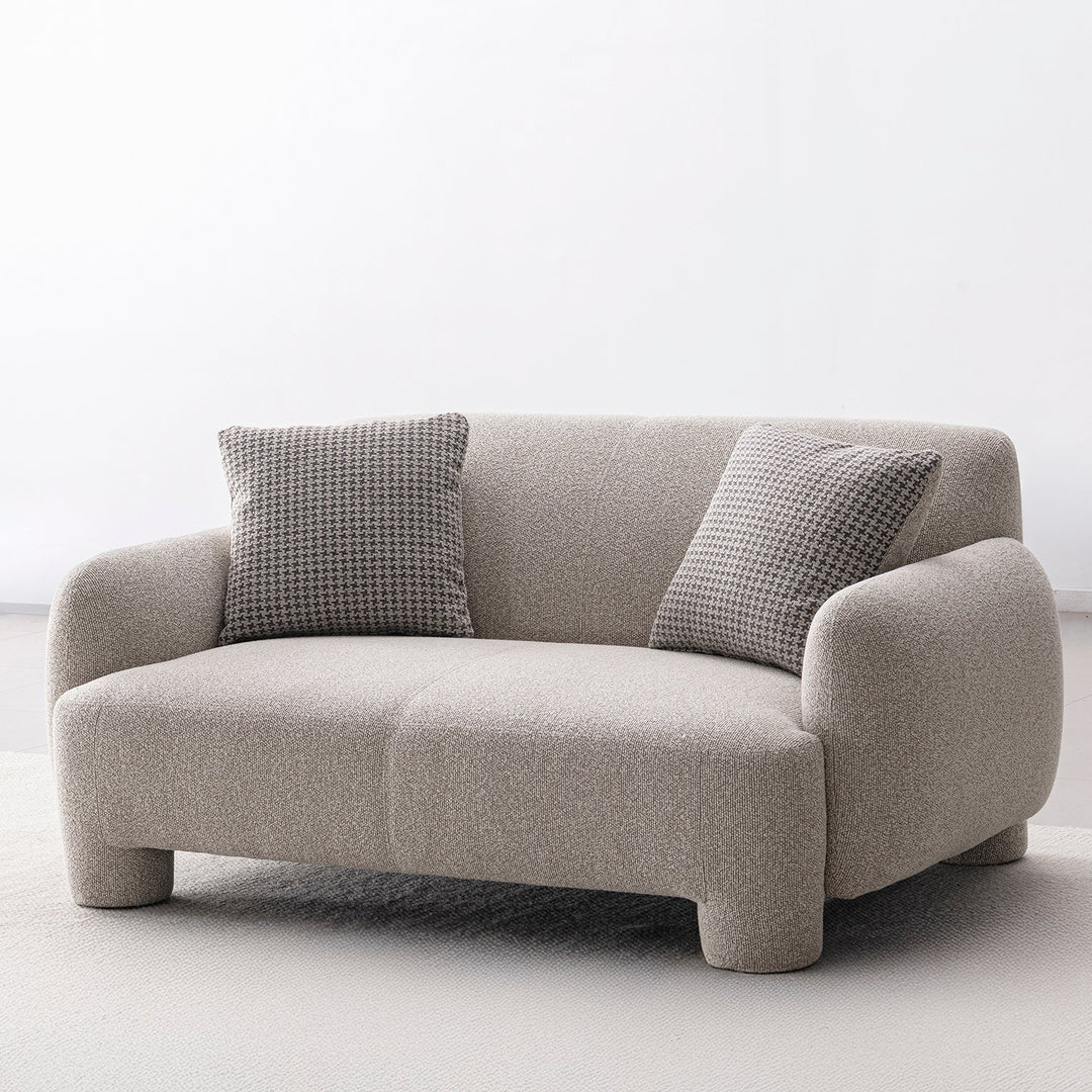 Cream mixed weave fabric 2 seater sofa syra in panoramic view.