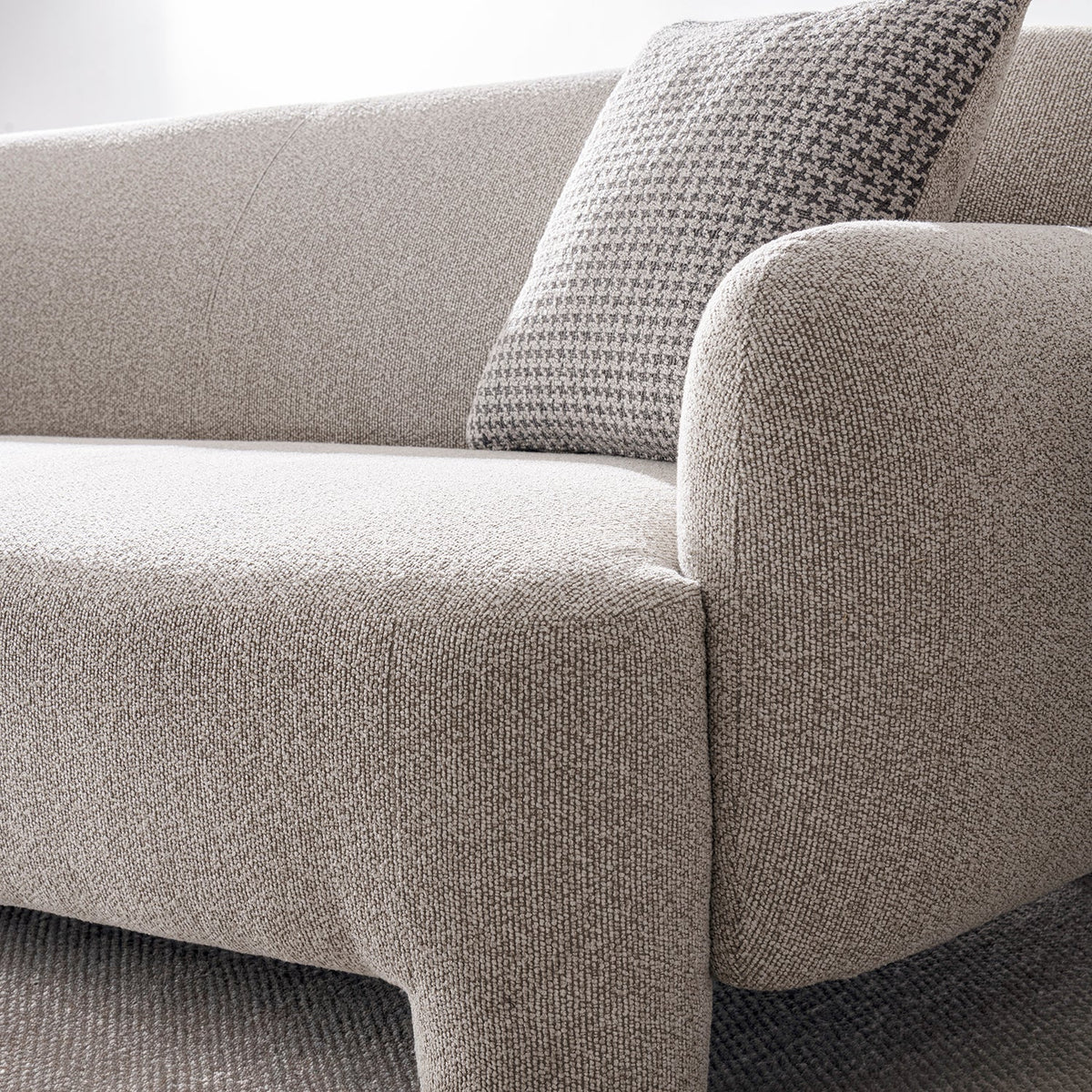 Cream mixed weave fabric 2 seater sofa syra in details.