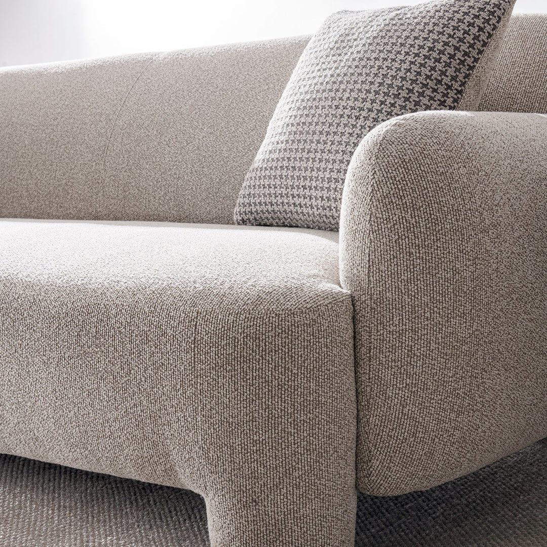 Cream mixed weave fabric 2 seater sofa syra in details.