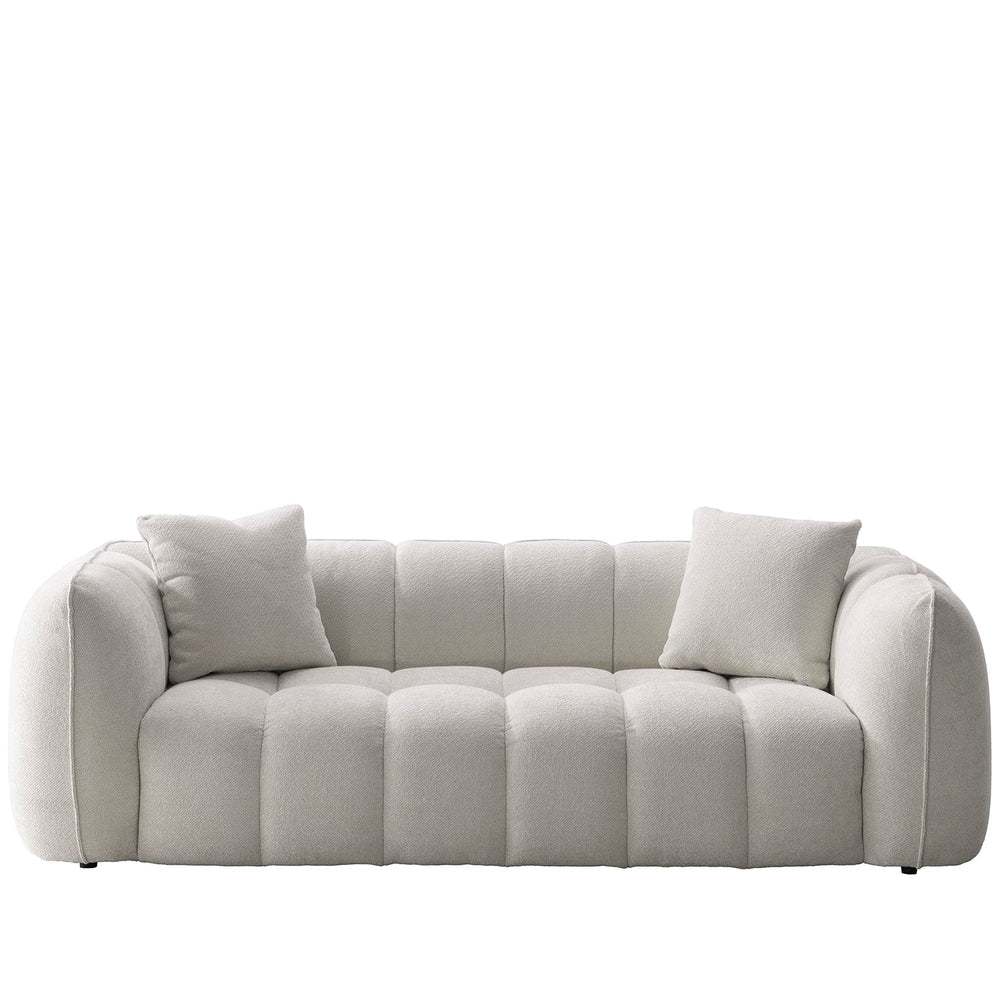 Cream mixed weave fabric 3 seater sofa puddy in white background.