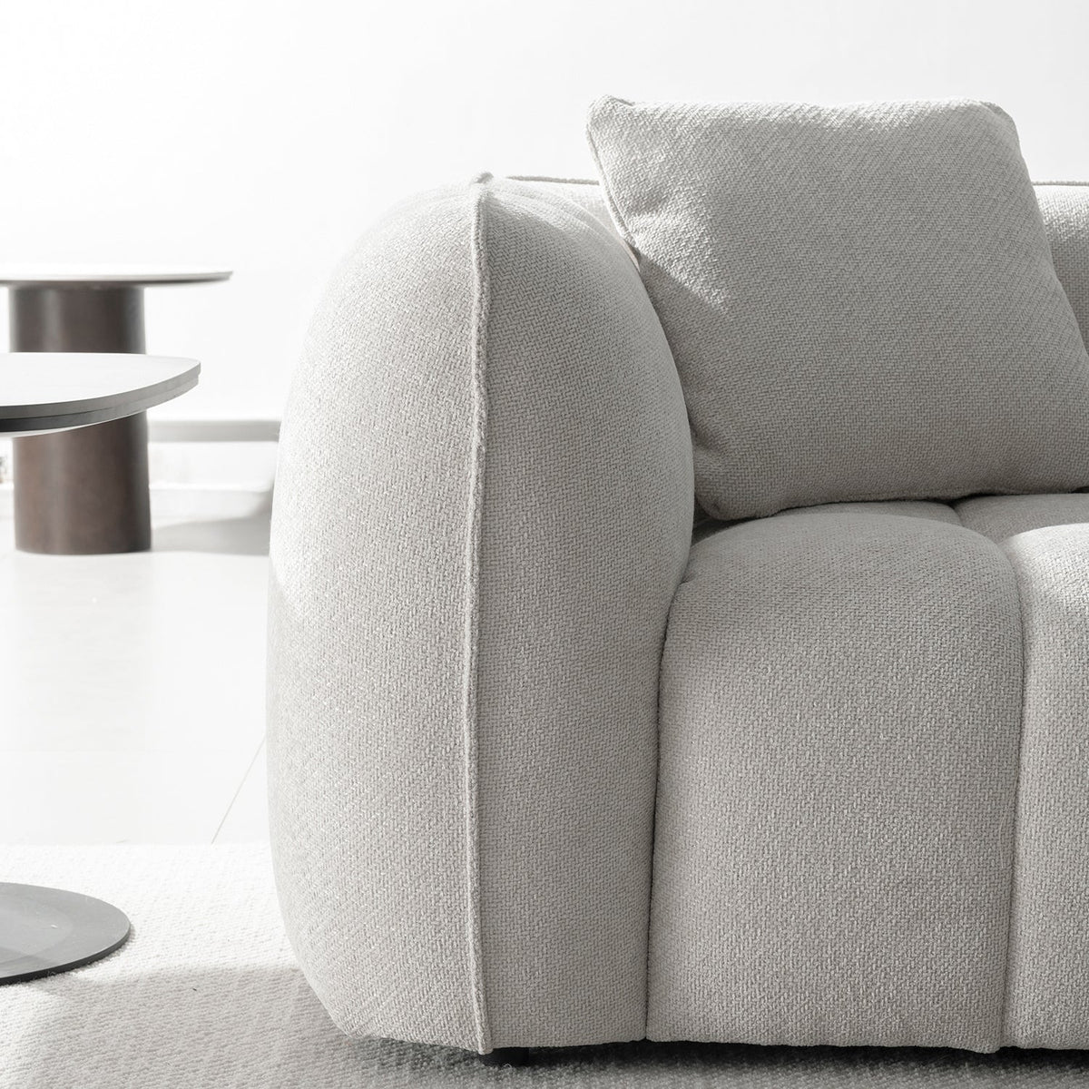 Cream mixed weave fabric 3 seater sofa puddy color swatches.