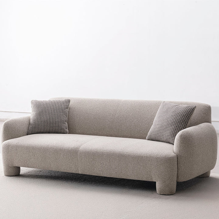 Cream mixed weave fabric 3 seater sofa syra in panoramic view.