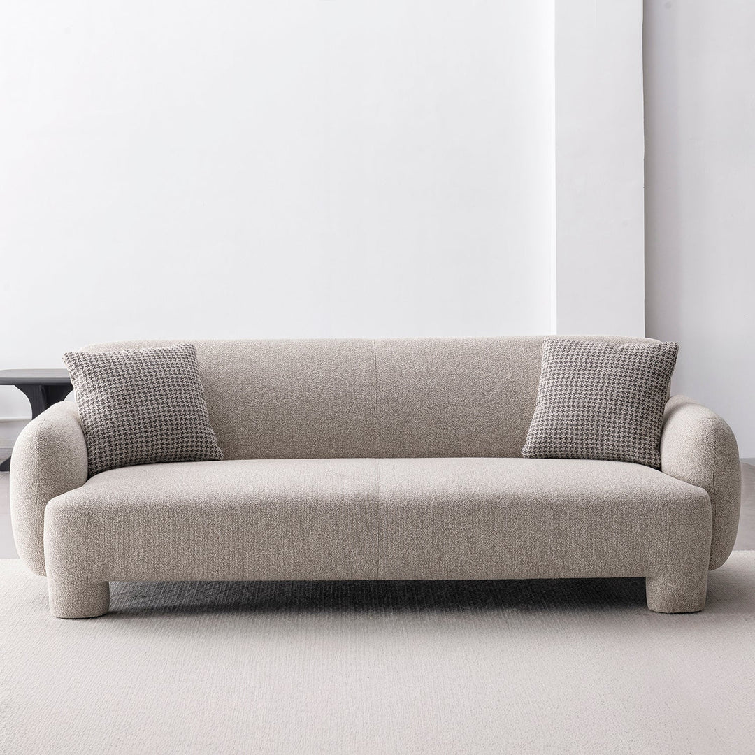 Cream mixed weave fabric 3 seater sofa syra in close up details.