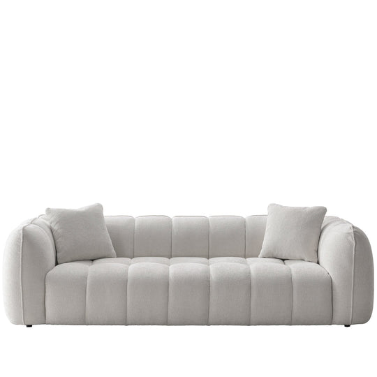Cream mixed weave fabric 4 seater sofa puddy in white background.