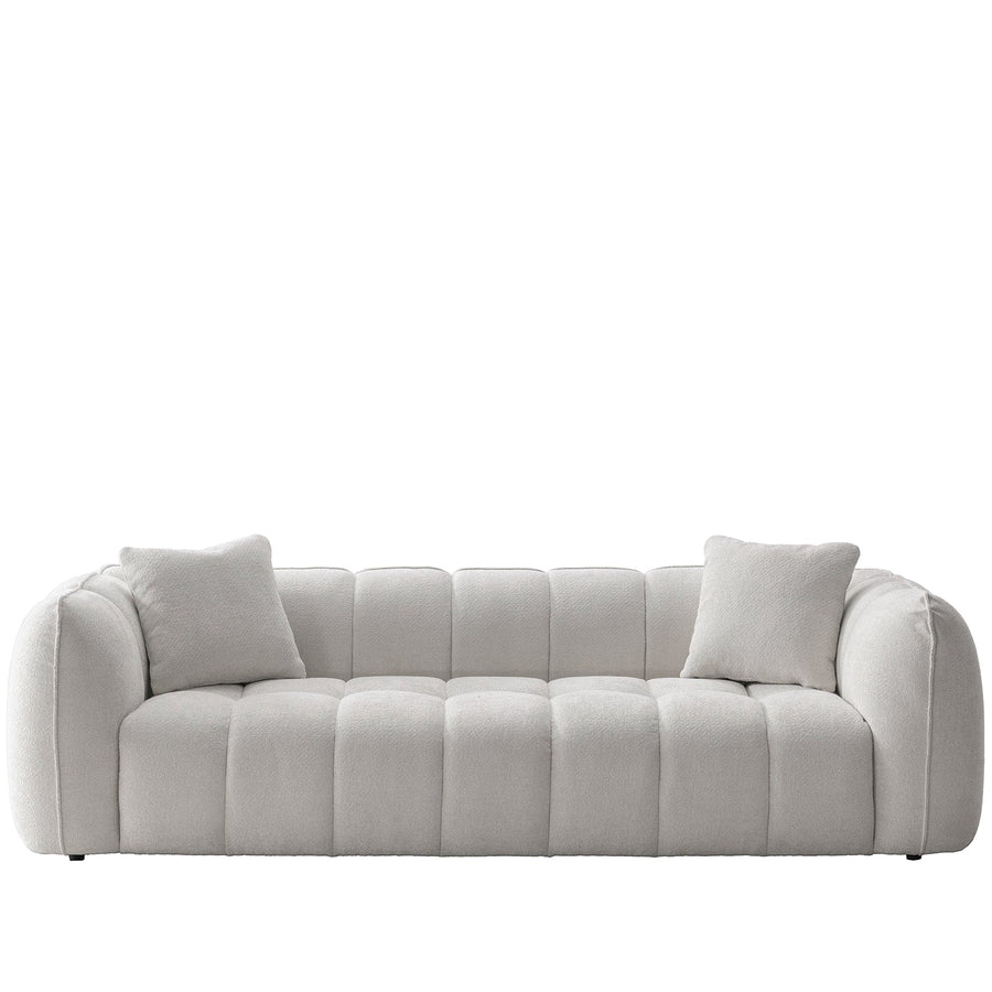 Cream mixed weave fabric 4 seater sofa puddy in white background.