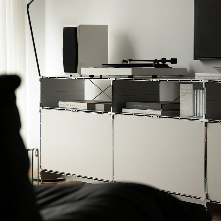 Industrial aluminium tv console cube with context.