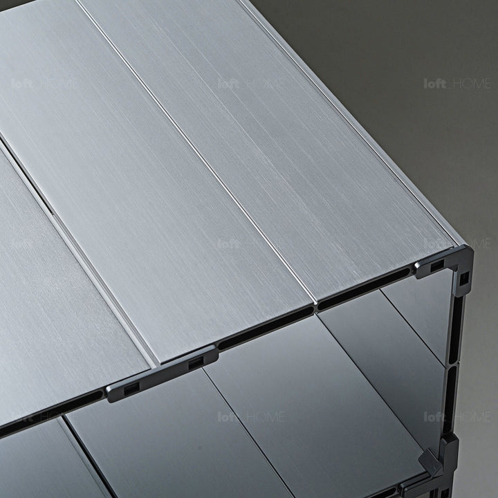 Industrial aluminium wheeled trolley side table cube in close up details.