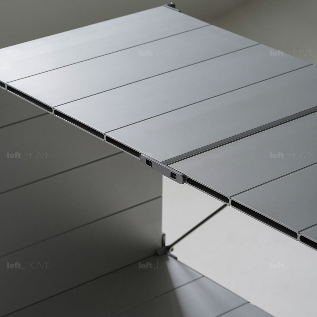 Bauhaus aluminium wheeled trolley side table cube in panoramic view.