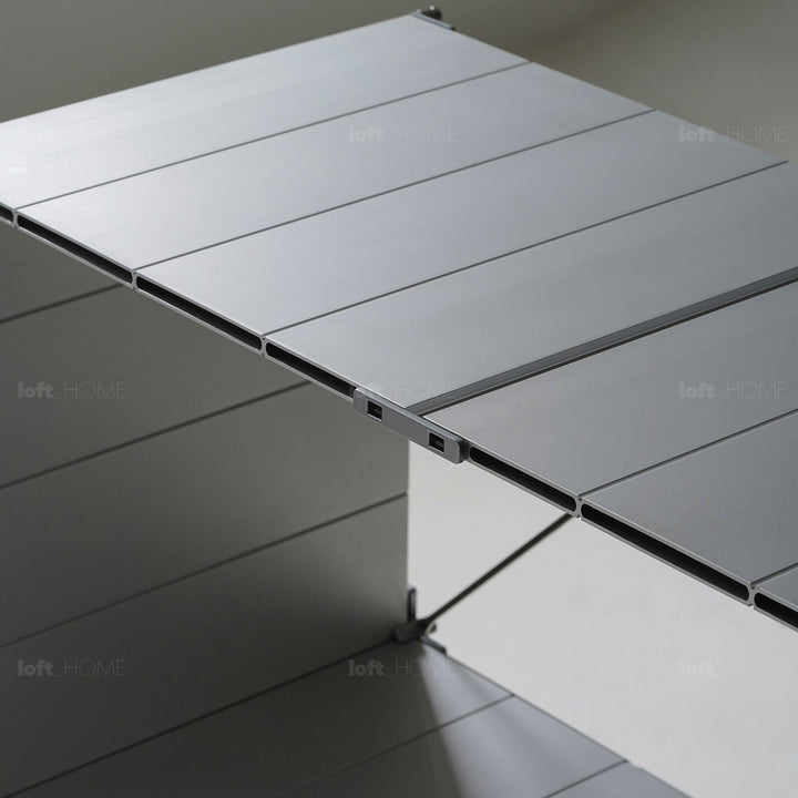 Bauhaus aluminium wheeled trolley side table cube in panoramic view.