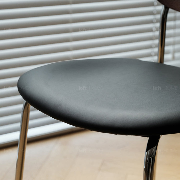 Industrial pu leather dining chair nika in real life style.