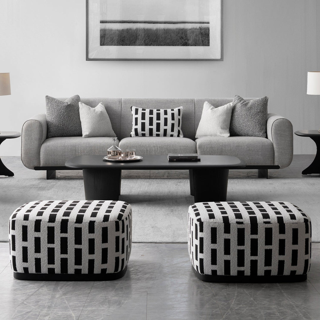 Japandi mixed weave fabric ottoman panna with context.