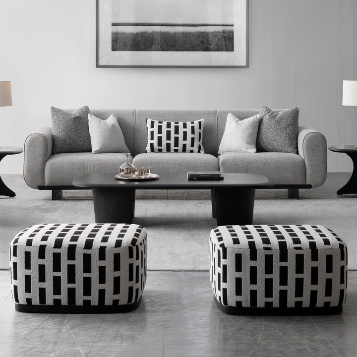 Japandi mixed weave fabric ottoman panna with context.