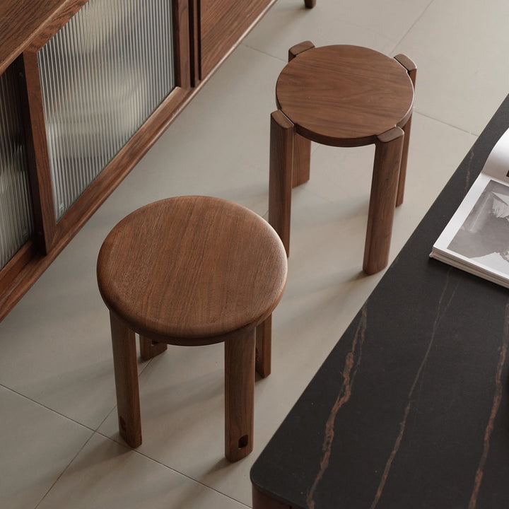 Japandi rubber wood stackable stool with wheels friday with context.