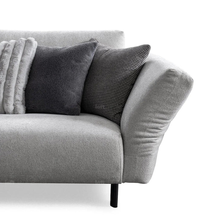 Modern boucle fabric bendable armrest 4 seater sofa pristine material variants.