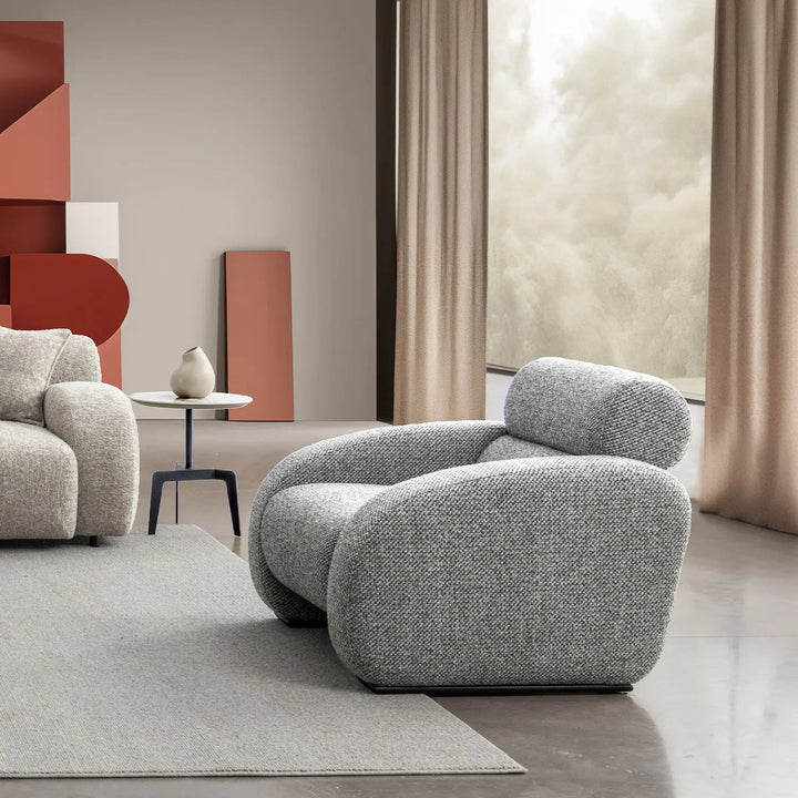 Modern mixed weave fabric 1 seater sofa monolithe primary product view.