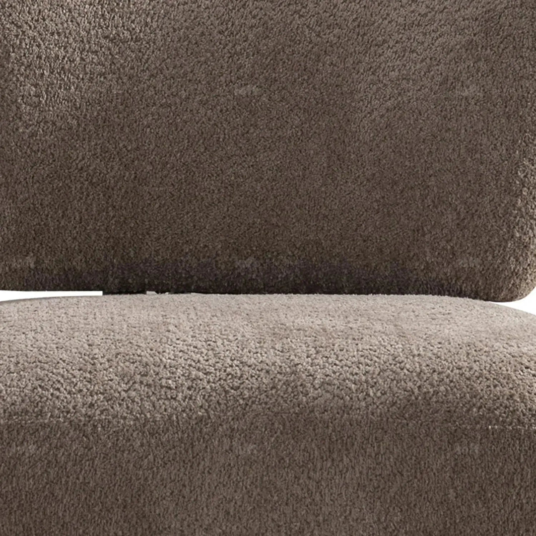 Cream sherpa fabric revolving 1 seater sofa rite in panoramic view.