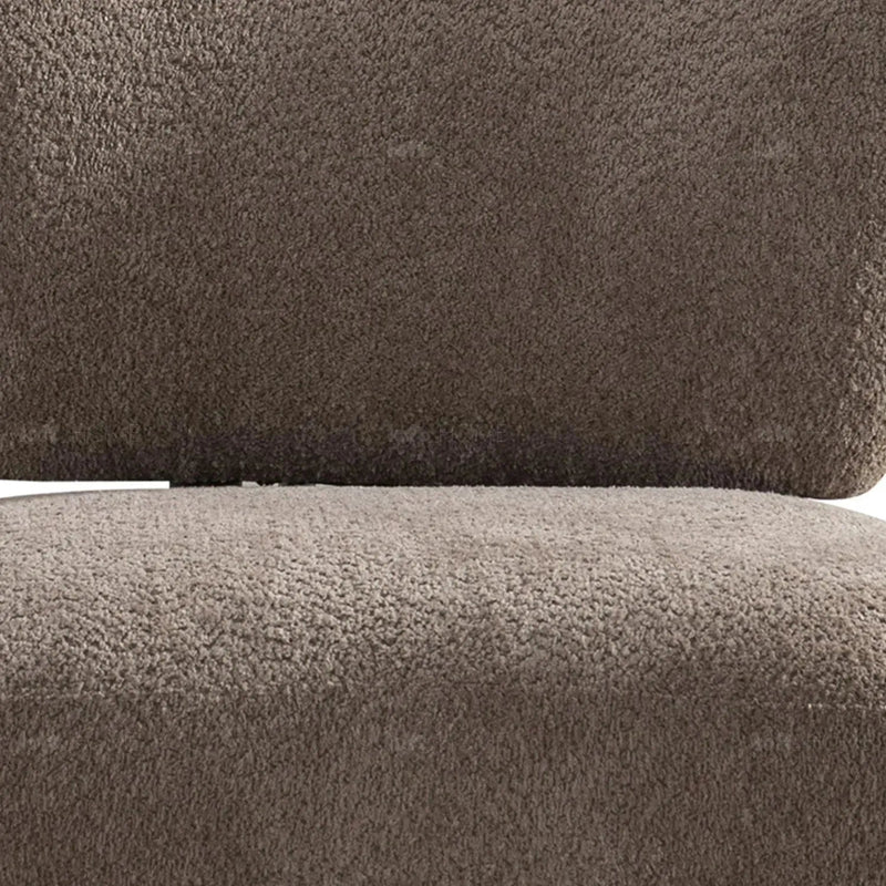 Cream sherpa fabric revolving 1 seater sofa rite in panoramic view.