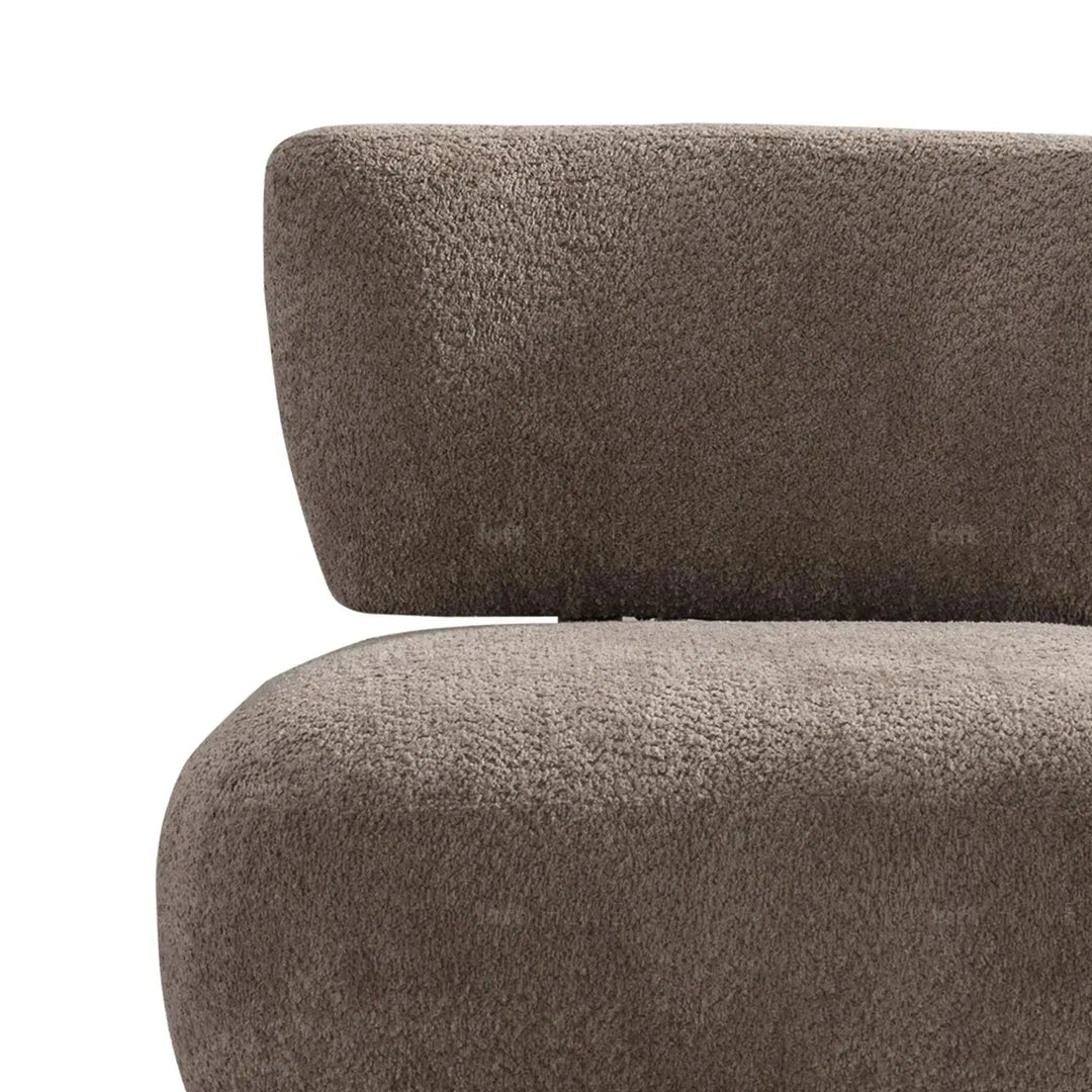 Cream sherpa fabric revolving 1 seater sofa rite with context.
