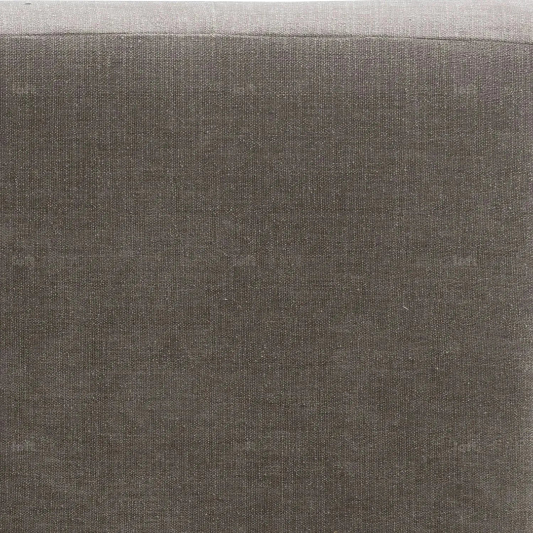 Modern mixed weave fabric revolving 1 seater sofa talc wood in panoramic view.