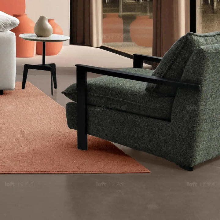 Modern mixed weave fabric 1 seater sofa turret in close up details.