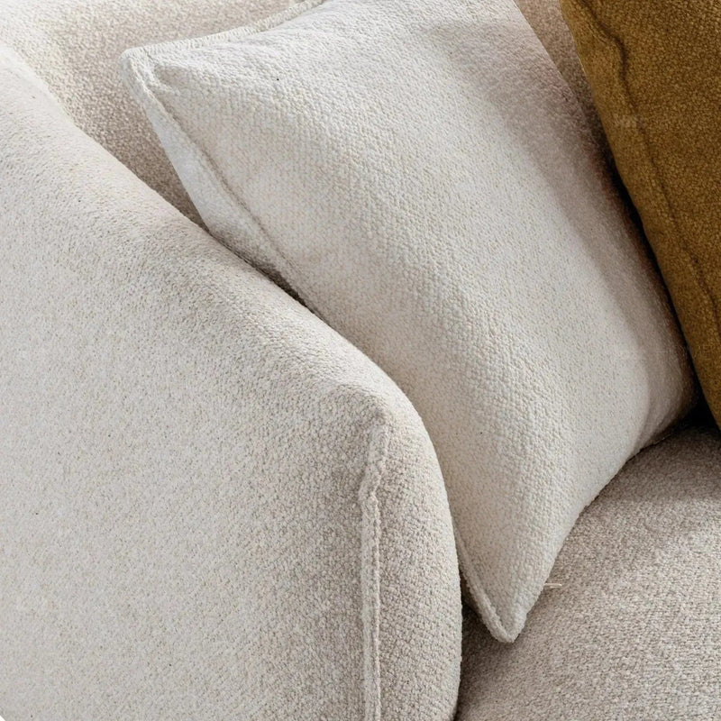 Modern fabric 4 seater sofa angler in still life.