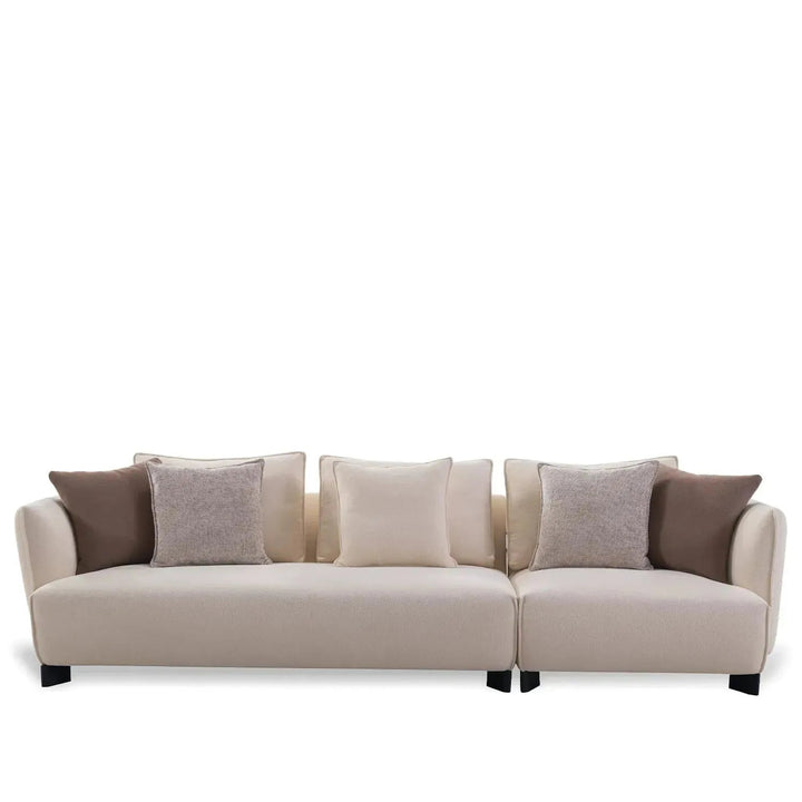 Modern fabric 4 seater sofa angler in white background.