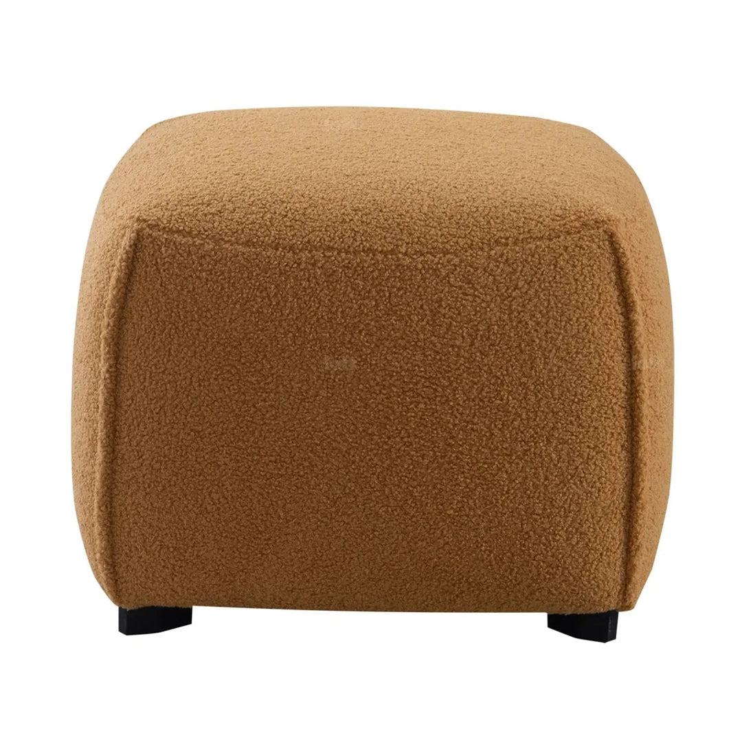 Cream sherpa fabric ottoman saffron color swatches.