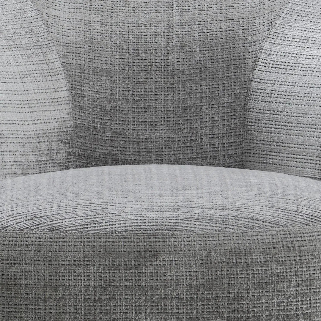 Cream mixed weave fabric revolving 1 seater sofa criet in panoramic view.