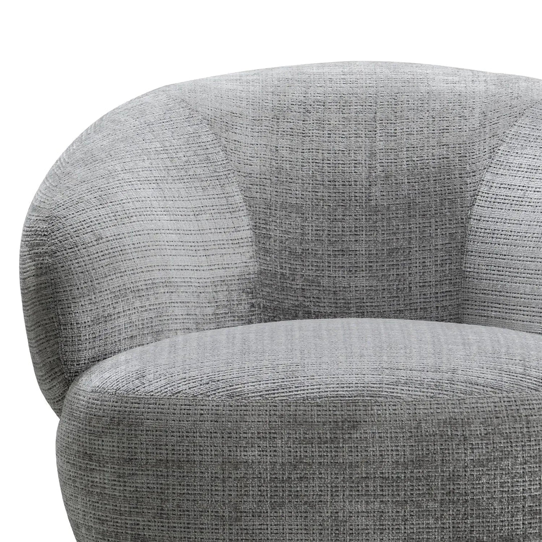 Cream mixed weave fabric revolving 1 seater sofa criet with context.