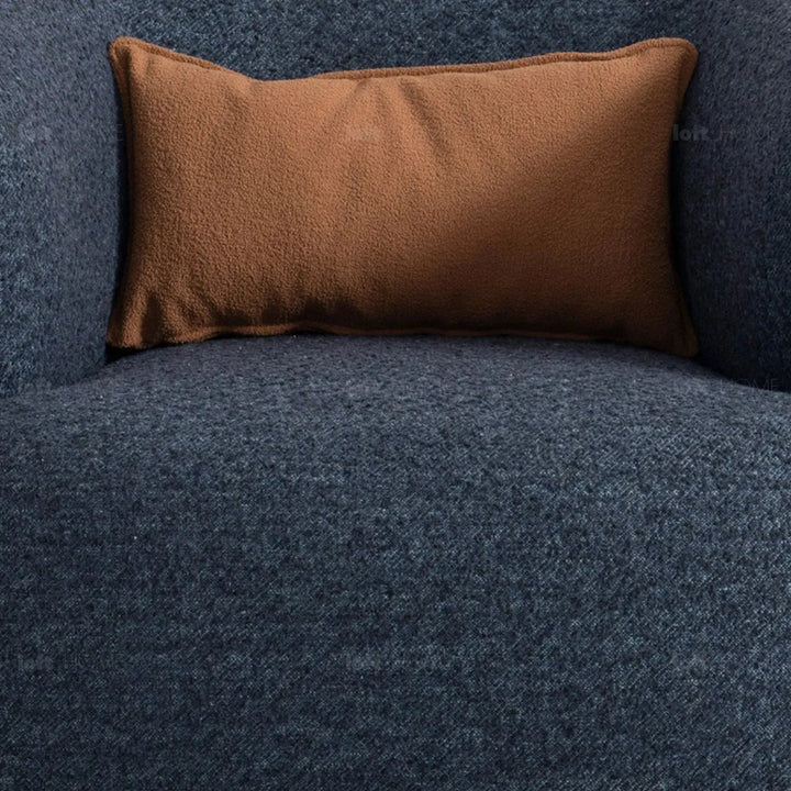 Cream boucle fabric revolving 1 seater sofa vance in close up details.