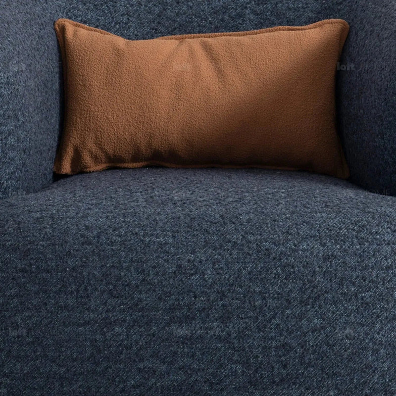 Cream boucle fabric revolving 1 seater sofa vance in close up details.
