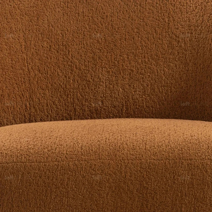 Cream sherpa fabric revolving 1 seater sofa vigor in panoramic view.